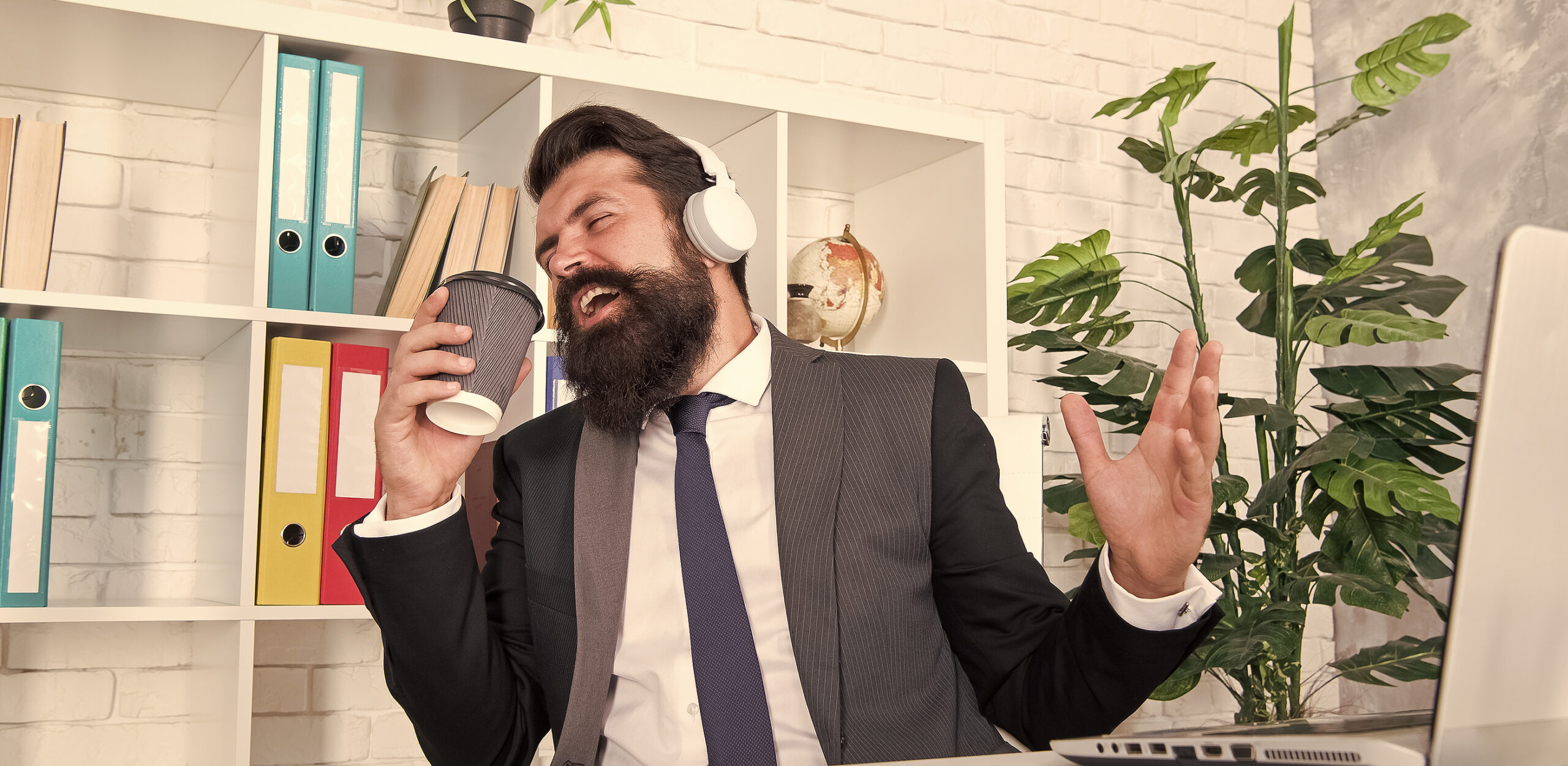 I Want To Break Free. Office Singer. Bearded Man Sing Song At Wo Happy Businessman listen to music in office